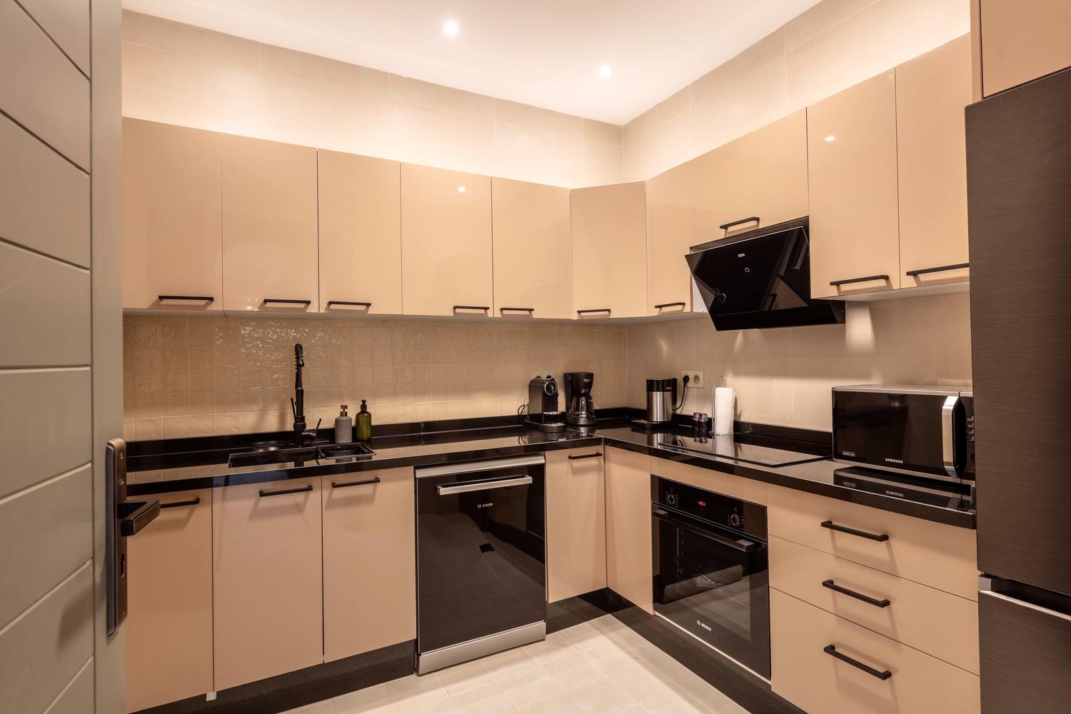 The private kitchen, fully fitted with oven, hob and dishwasher